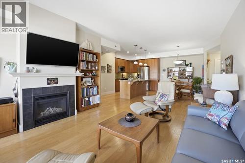 327 1010 Ruth Street E, Saskatoon, SK - Indoor Photo Showing Living Room With Fireplace