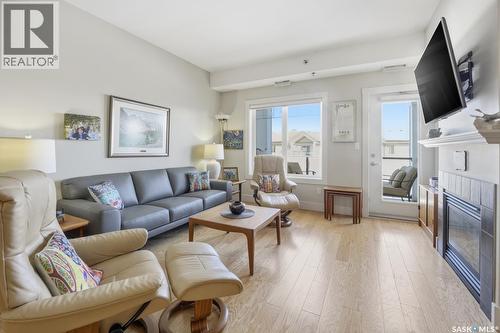 327 1010 Ruth Street E, Saskatoon, SK - Indoor Photo Showing Living Room With Fireplace