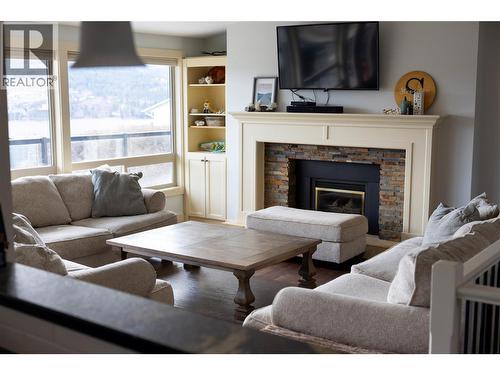 8705 Kalview Drive, Coldstream, BC - Indoor Photo Showing Living Room With Fireplace