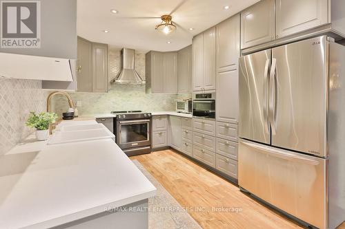 Chandelier, Quartz Counters - 431 Naomi Crescent, Mississauga, ON - Indoor Photo Showing Kitchen With Upgraded Kitchen