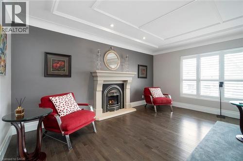 Sitting area with gas fireplace - 18 Stonegate Drive, Hamilton, ON - Indoor With Fireplace
