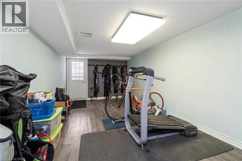 Separate entrance to exercise room with flexibility for home busines - 18 Stonegate Drive, Hamilton, ON - Indoor Photo Showing Gym Room