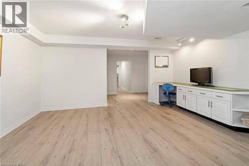 Office or mudroom space with garage entry, lower level - 18 Stonegate Drive, Hamilton, ON - Indoor Photo Showing Other Room