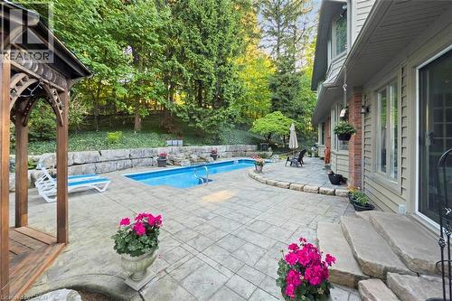 Inground pool and patio - 18 Stonegate Drive, Hamilton, ON - Outdoor With In Ground Pool