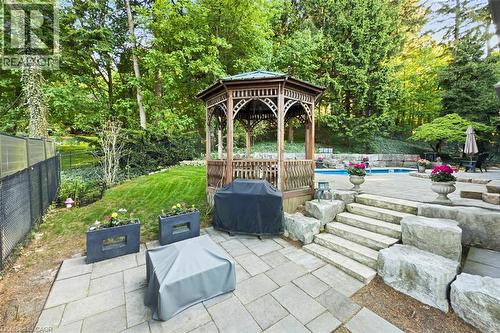 Patio space for gathering with gazebo - 18 Stonegate Drive, Hamilton, ON - Outdoor With Backyard