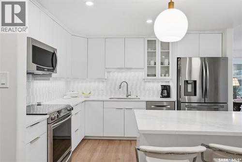 111 619 Saskatchewan Crescent W, Saskatoon, SK - Indoor Photo Showing Kitchen With Upgraded Kitchen