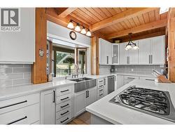 Farmhouse sink with bay window view - 