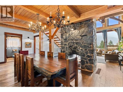 Dining area with live-edge rosewood table - 1403 Notch Hill Road, Sorrento, BC - Indoor Photo Showing Dining Room