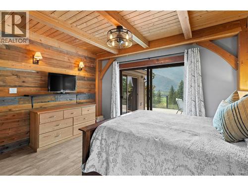 Primary Bedroom - reverse view - 1403 Notch Hill Road, Sorrento, BC - Indoor Photo Showing Bedroom
