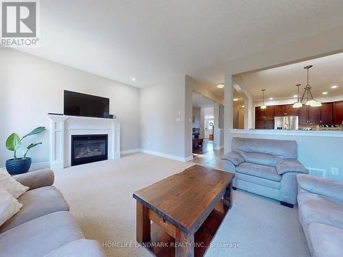 73 Graihawk Drive, Barrie, ON - Indoor Photo Showing Living Room With Fireplace