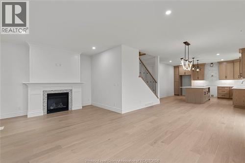 357 Marla Crescent, Lakeshore, ON - Indoor Photo Showing Living Room With Fireplace