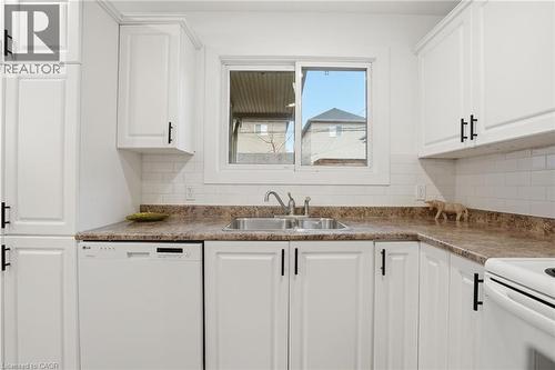 68 Delena Avenue N, Hamilton, ON - Indoor Photo Showing Kitchen With Double Sink