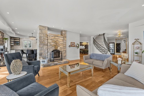 Salon - 729 Boul. Union, Laval (Sainte-Dorothée), QC - Indoor Photo Showing Living Room With Fireplace