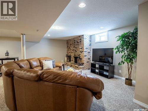 128 Mcdougall Crescent, Regina, SK - Indoor With Fireplace