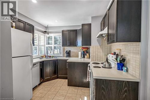 146 West 25Th Street, Hamilton, ON - Indoor Photo Showing Kitchen With Double Sink