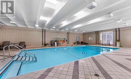 202 - 3700 Kaneff Crescent, Mississauga, ON - Indoor Photo Showing Other Room With In Ground Pool