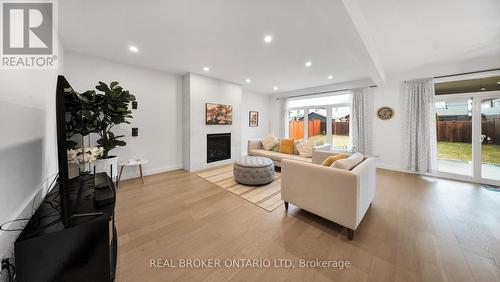 68 Locky Lane, Middlesex Centre, ON - Indoor Photo Showing Living Room With Fireplace
