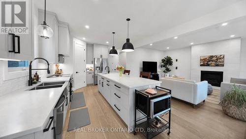 68 Locky Lane, Middlesex Centre, ON - Indoor Photo Showing Kitchen With Double Sink With Upgraded Kitchen