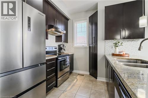 310 Fall Fair Way Unit# 34, Binbrook, ON - Indoor Photo Showing Kitchen With Double Sink With Upgraded Kitchen