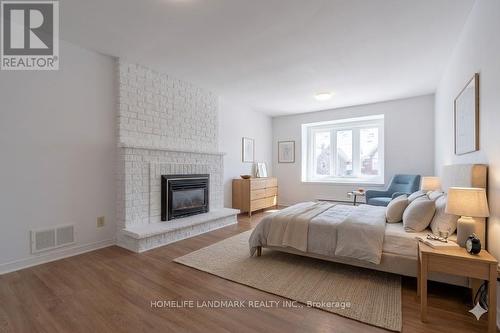 2453 Strathmore Crescent, Mississauga, ON - Indoor Photo Showing Bedroom With Fireplace
