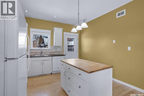 801 1St Avenue, Rosthern, SK - Indoor Photo Showing Kitchen With Double Sink