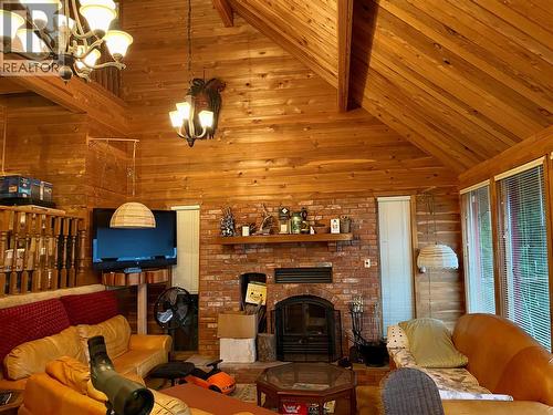 31 Lime Cliffs Beach, Sicamous, BC - Indoor Photo Showing Living Room With Fireplace