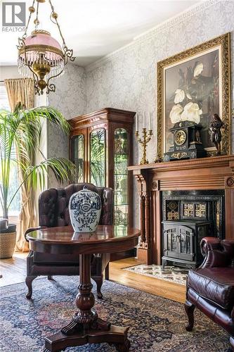 122 East Avenue S, Hamilton, ON - Indoor Photo Showing Living Room With Fireplace
