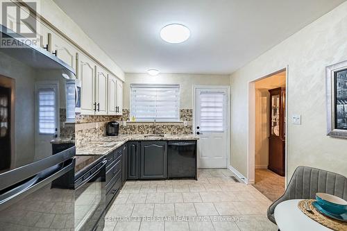 Very Large Kitchen, Door To Backyard - 25 Devonshire Drive, Brampton, ON - Indoor Photo Showing Kitchen