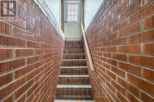 Stairs To Side Door & Garage - 25 Devonshire Drive, Brampton, ON - Indoor Photo Showing Other Room