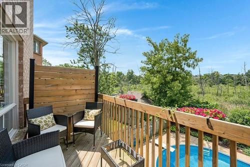 Balcony off Breackfast Area - 32 Kingfisher Crescent, Cambridge, ON - Outdoor With In Ground Pool With Deck Patio Veranda With Exterior