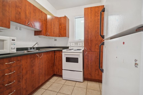 Cuisine - 206-3375 Av. Ridgewood, Montréal (Côte-Des-Neiges/Notre-Dame-De-Grâce), QC - Indoor Photo Showing Kitchen With Double Sink