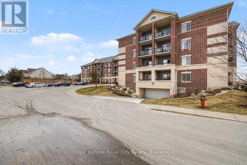Access to underground parking - 412 - 308 Watson Parkway N, Guelph (Grange Road), ON - Outdoor With Facade