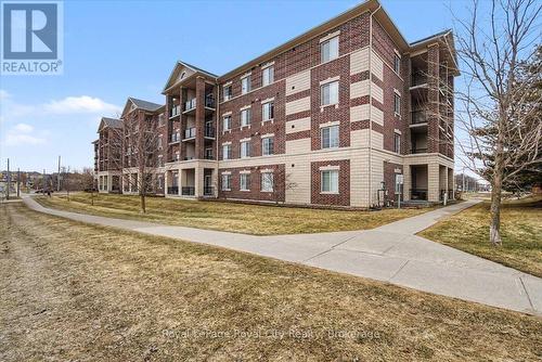 412 - 308 Watson Parkway N, Guelph (Grange Road), ON - Outdoor With Facade