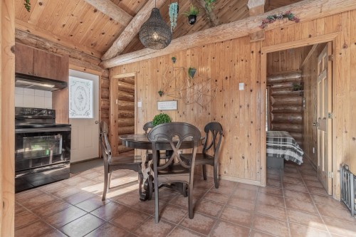 Dining Room - 1364 5E Avenue, Saint-Gabriel-De-Valcartier, QC - Indoor With Fireplace