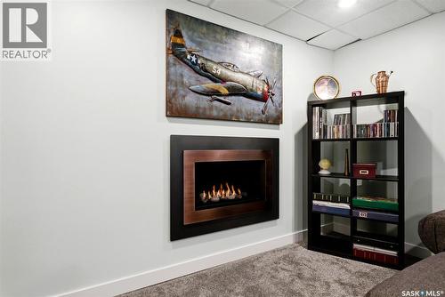 166 Deergrove Crescent, Regina, SK - Indoor With Fireplace