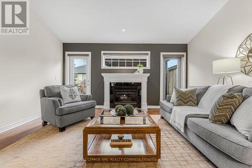 48 - 605 Welland Avenue, St. Catharines (Carlton/Bunting), ON - Indoor Photo Showing Living Room With Fireplace