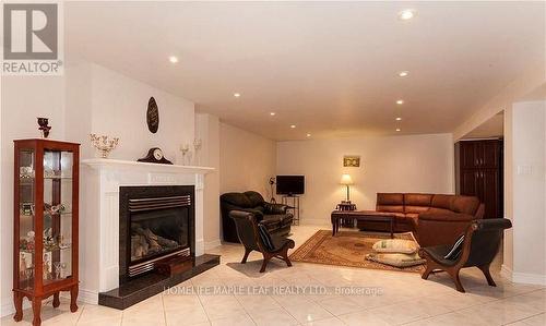 694 Gypsy Fly Crescent, Mississauga, ON - Indoor Photo Showing Living Room With Fireplace