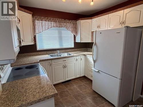 154 Parker Crescent, Canora, SK - Indoor Photo Showing Kitchen With Double Sink