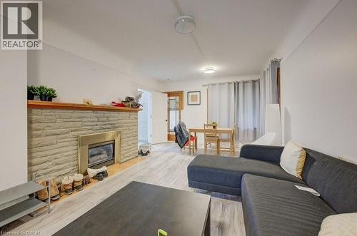 74 Mcdougall Road, Waterloo, ON - Indoor Photo Showing Living Room With Fireplace