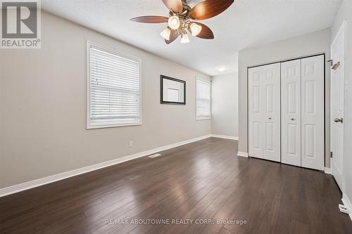 His and hers closet - 427 Bankside Crescent, Kitchener, ON - Indoor Photo Showing Other Room