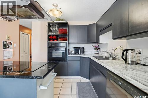 882 Samuels Crescent N, Regina, SK - Indoor Photo Showing Kitchen With Double Sink