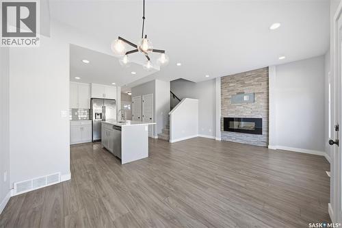 16 1003 Evergreen Boulevard, Saskatoon, SK - Indoor With Fireplace