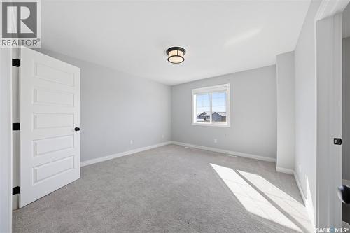 16 1003 Evergreen Boulevard, Saskatoon, SK - Indoor Photo Showing Other Room