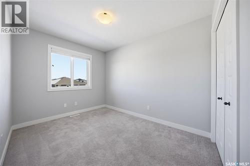 16 1003 Evergreen Boulevard, Saskatoon, SK - Indoor Photo Showing Other Room
