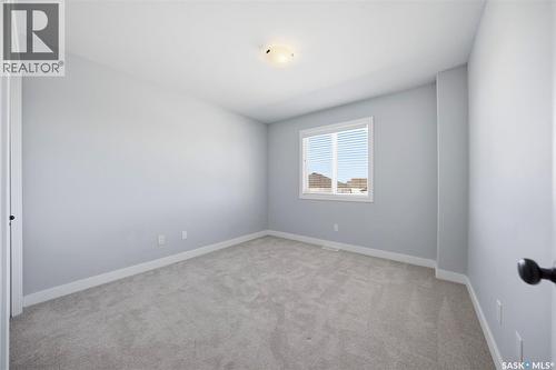16 1003 Evergreen Boulevard, Saskatoon, SK - Indoor Photo Showing Other Room