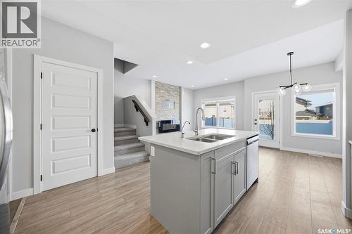16 1003 Evergreen Boulevard, Saskatoon, SK - Indoor Photo Showing Kitchen With Double Sink