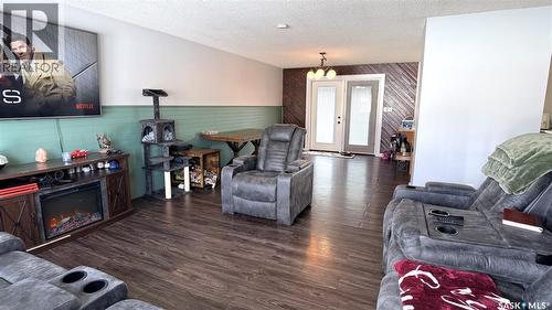 422 Spruce Drive, Estevan, SK - Indoor Photo Showing Living Room With Fireplace