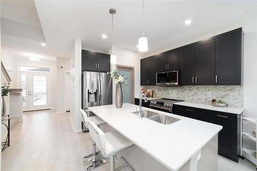 182 Moonlight Bay, Winnipeg, MB - Indoor Photo Showing Kitchen With Double Sink With Upgraded Kitchen