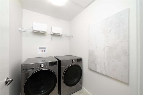182 Moonlight Bay, Winnipeg, MB - Indoor Photo Showing Laundry Room