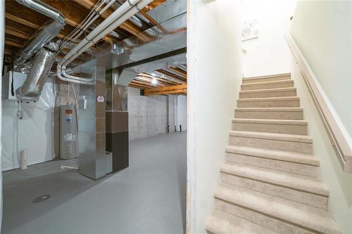 182 Moonlight Bay, Winnipeg, MB - Indoor Photo Showing Basement